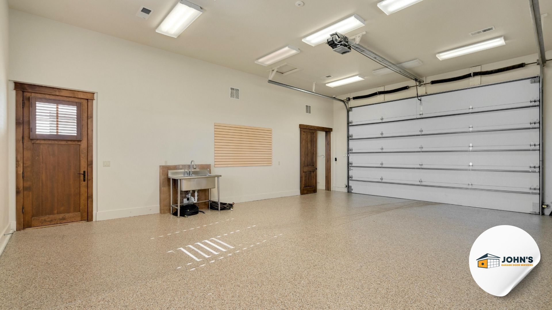 Inspect Your Tracks and Rollers - Is Your Garage Door Reversing for No Reason? How to Fix It — Garage Door Sensor Troubleshooting